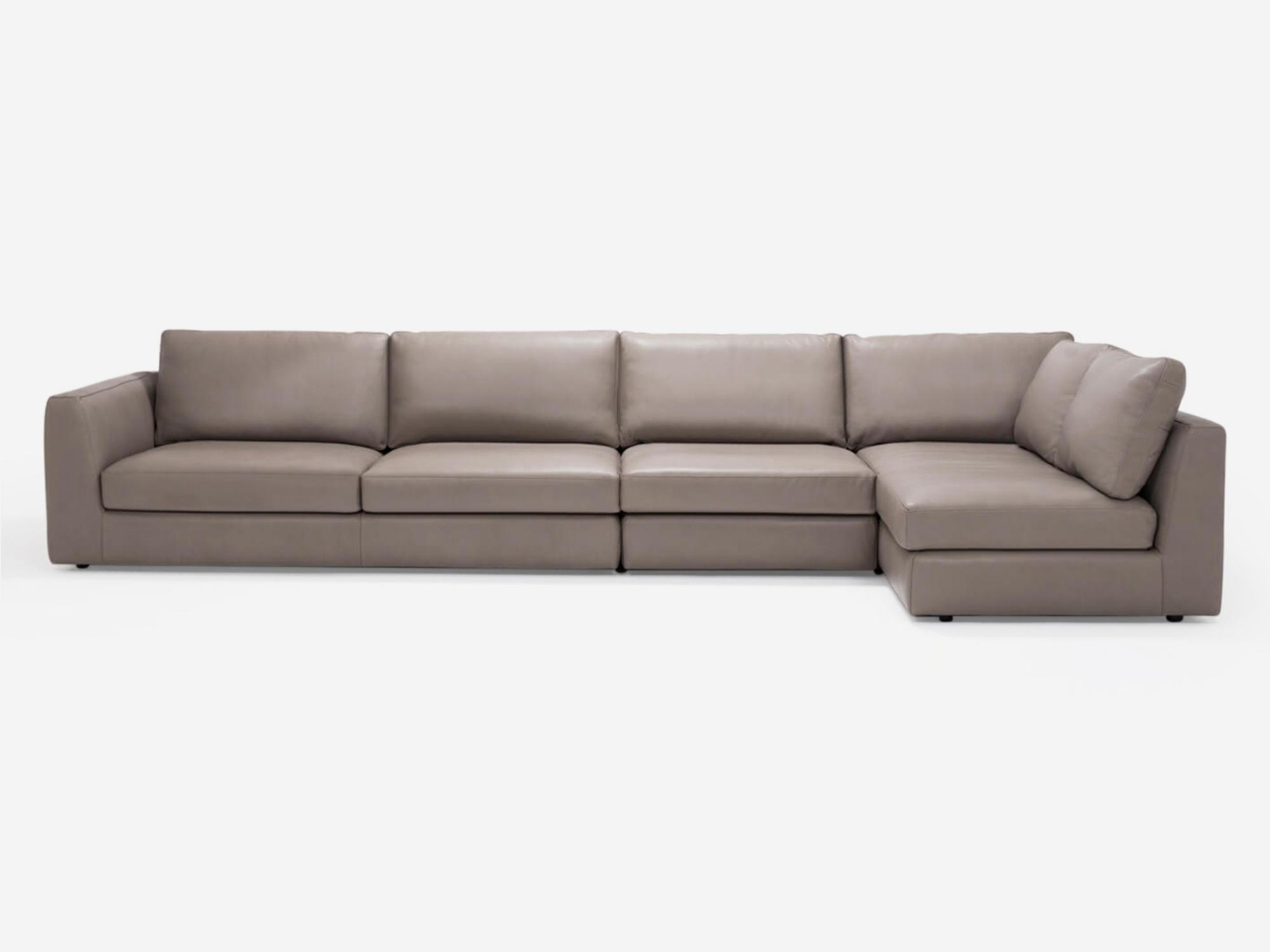 Front view of the Cello 3-piece sectional couch with full arm chaise in tan leather